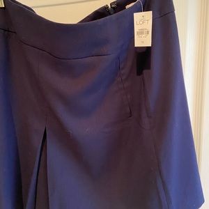 Blue mini skirt with pleats